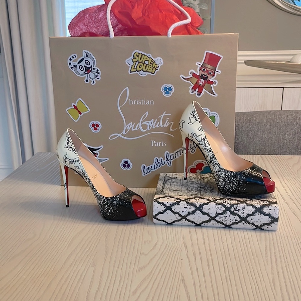 One of a kind authentic Christian louboutin pumps ! New / white glove care